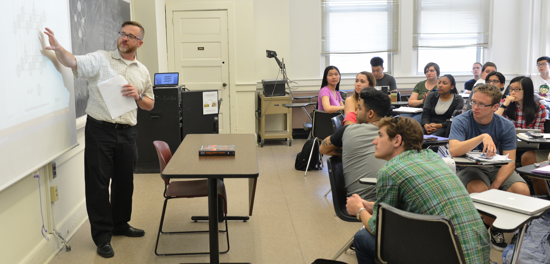Professor Christopher Weyant teaching to a class